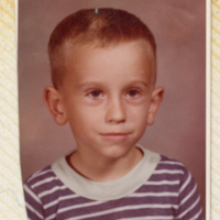 MAF0009_photograph-of-a-small-boy-in-striped-shirt.jpg